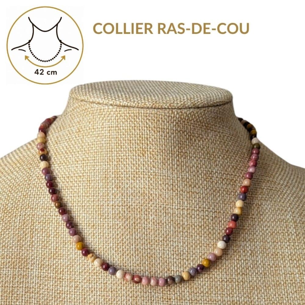 Collier ras-de-cou en jaspe mokaïte de 42 cm offrant un tombé élégant qui sublime naturellement le cou. Un bijou intemporel qui associe style, confort et les vertus traditionnellement attribuées au jaspe mokaïte, reconnues pour favoriser l'ancrage, la confiance, le dynamisme et la prise de décision.