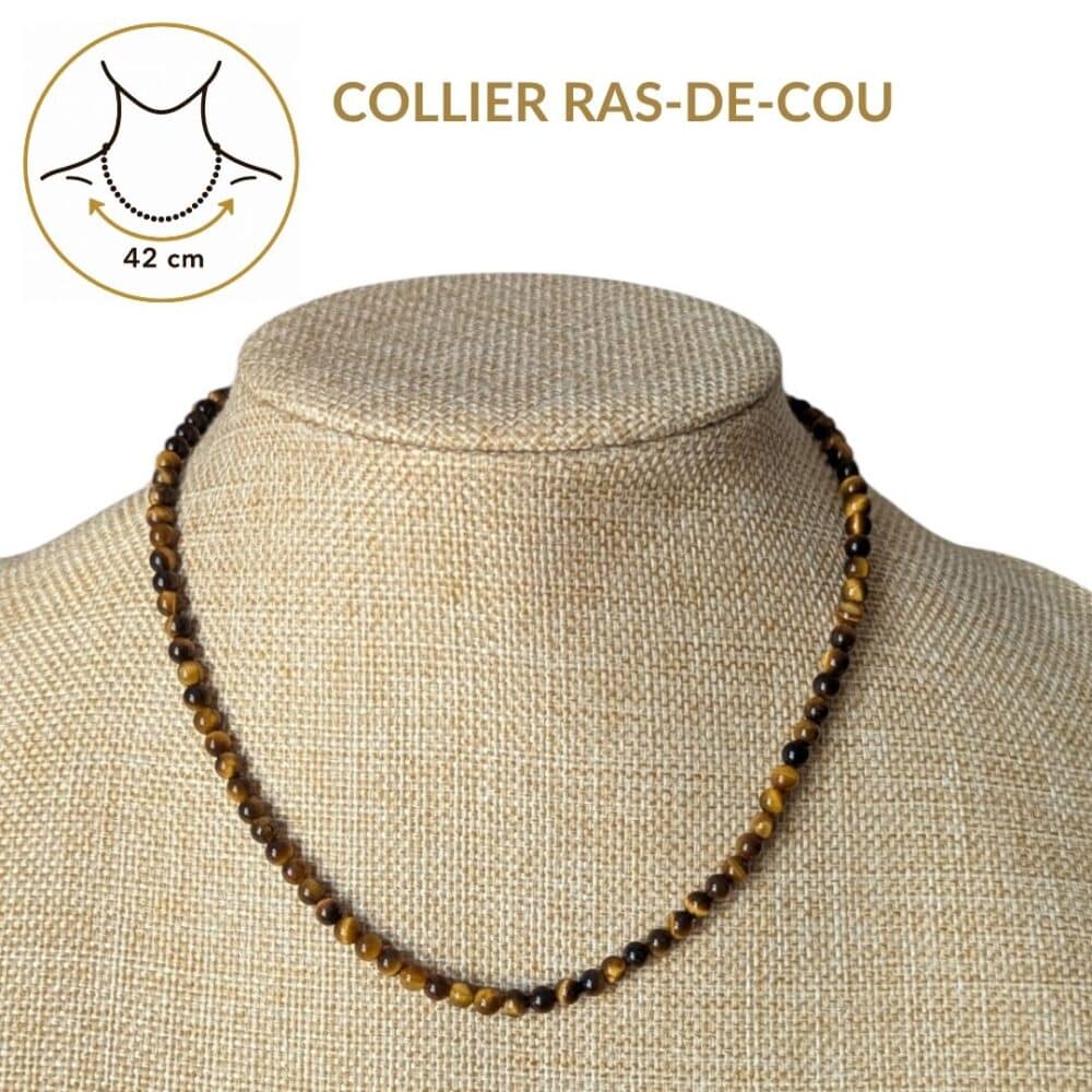 Collier ras-de-cou en œil de tigre de 42 cm offrant un tombé élégant qui sublime naturellement le cou. Un bijou intemporel qui associe style, confort et les vertus traditionnellement attribuées au œil de tigre, reconnues pour favoriser la protection, le courage, la confiance en soi et la force intérieure.